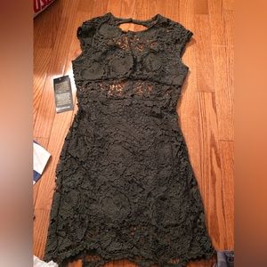 Army Green laced Bebe dress size 4 new with tags (partially backless)